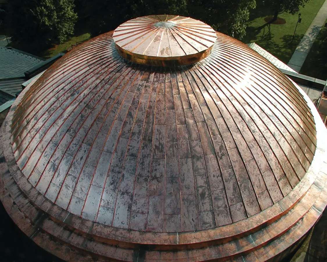 Craftsman Roofing crew installing a new roof in Brattle